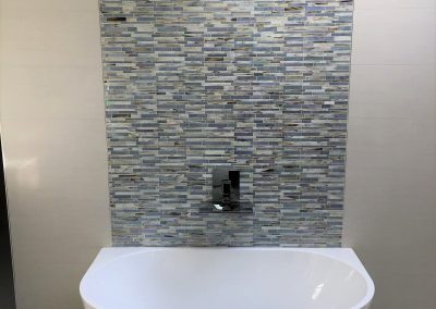 Tub and tile accent wall.